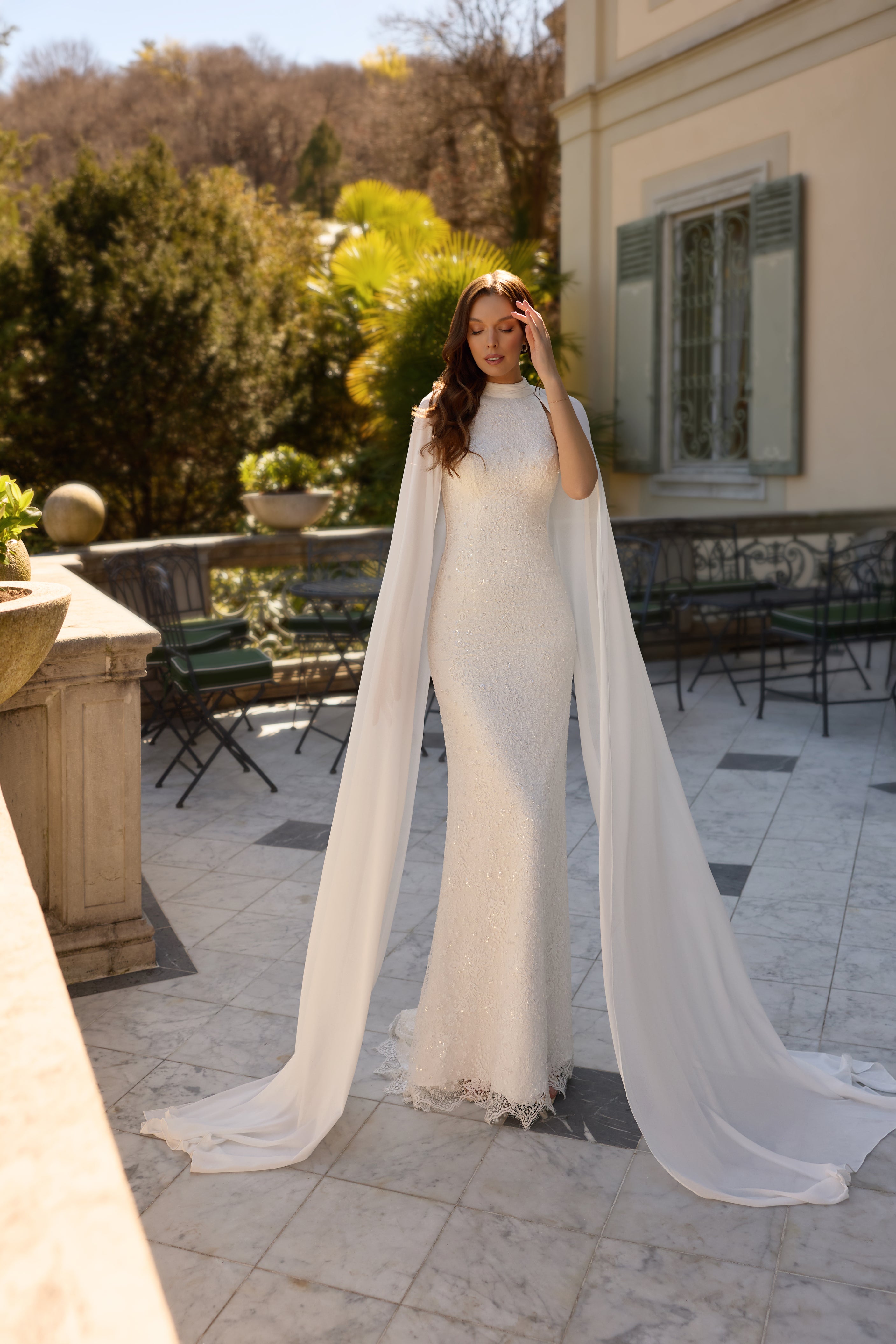Elina-high-neck-lace-wedding-dress-detachable-chiffon-cape-beaded-floral-embroidery