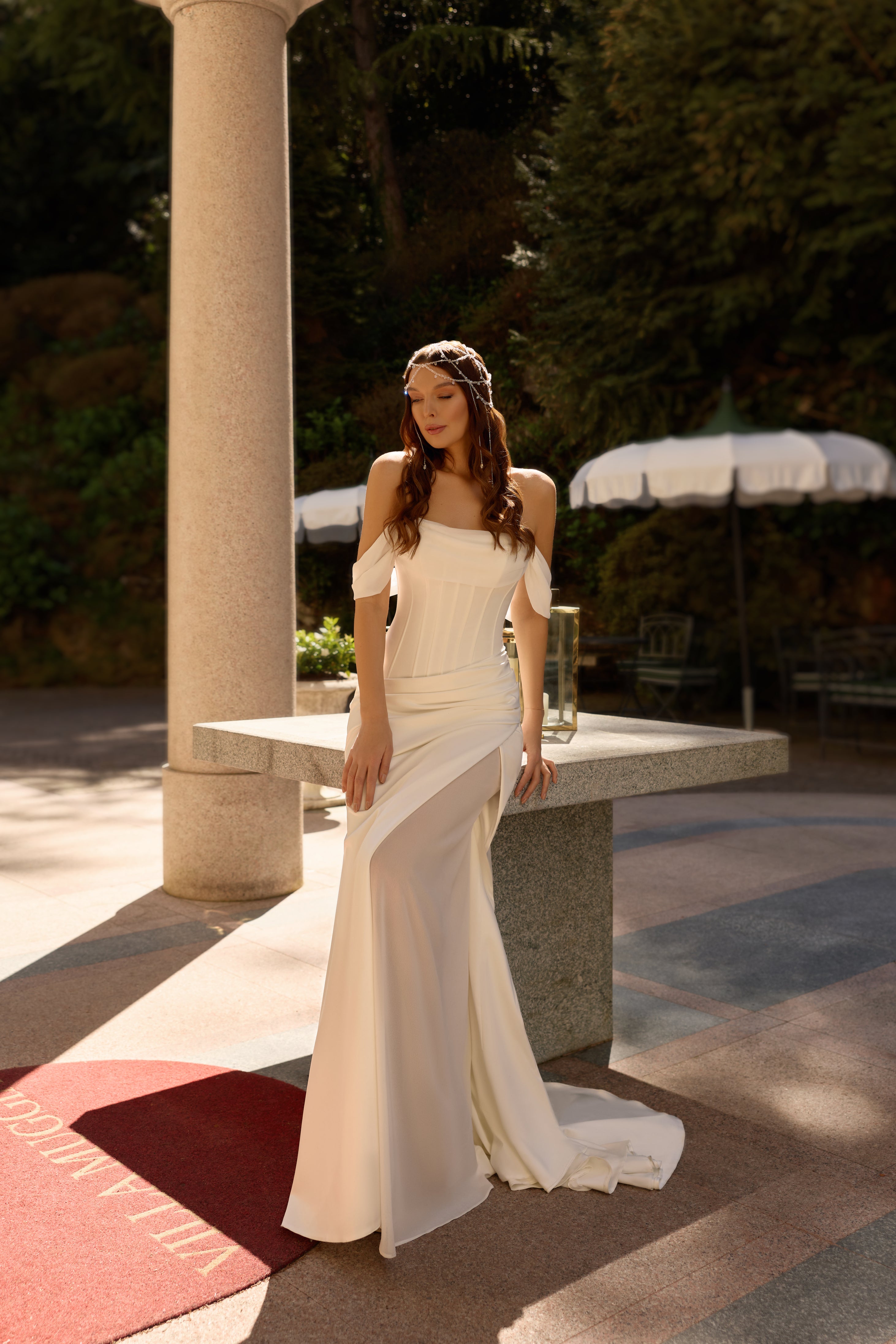 Flora-sculpted-draped-column-wedding-dress-off-the-shoulder-high-slit.