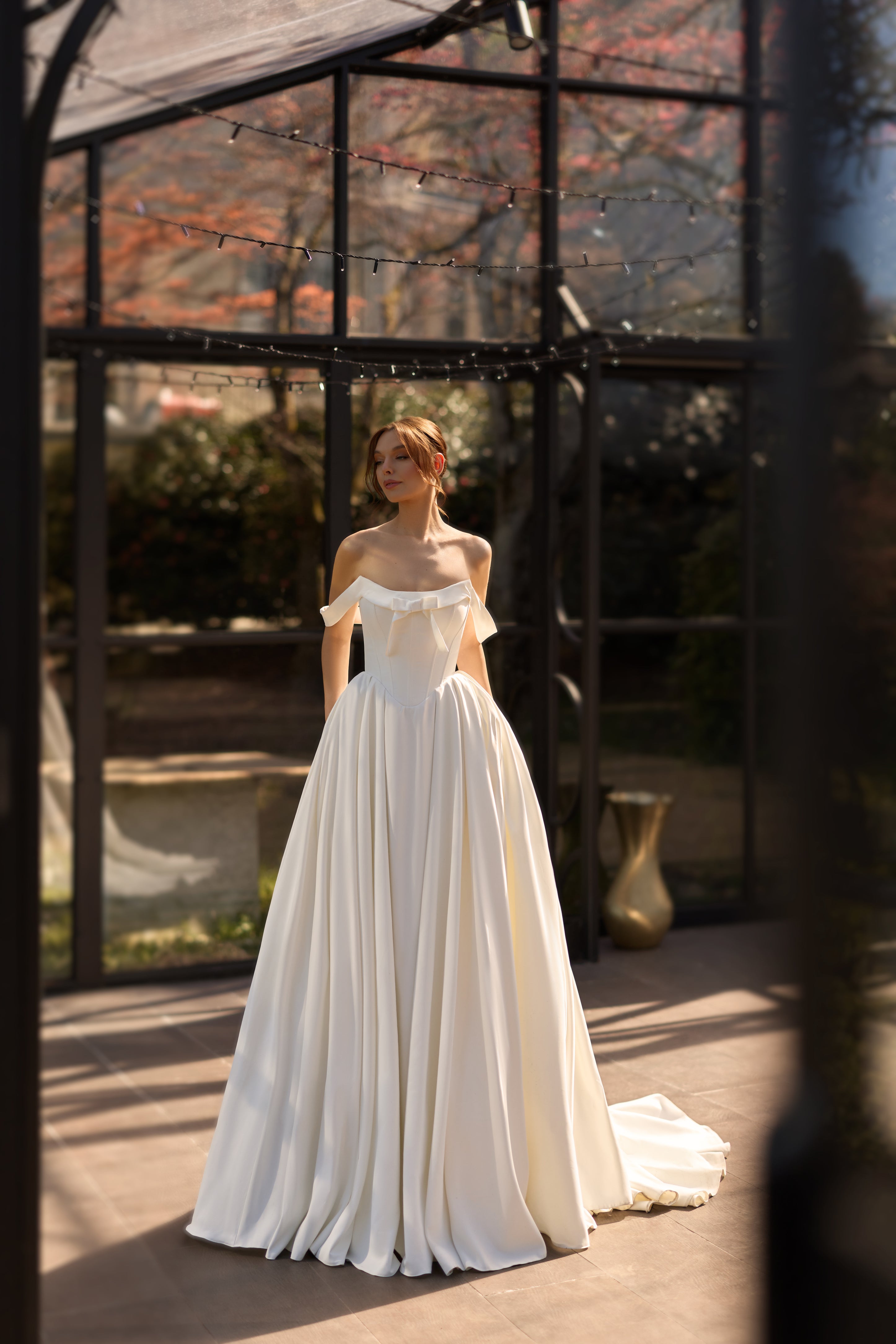 Lusia-mikado-princess-wedding-dress-off-the-shoulder-bow-detail.